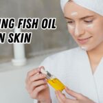 Applying fish oil on skin
